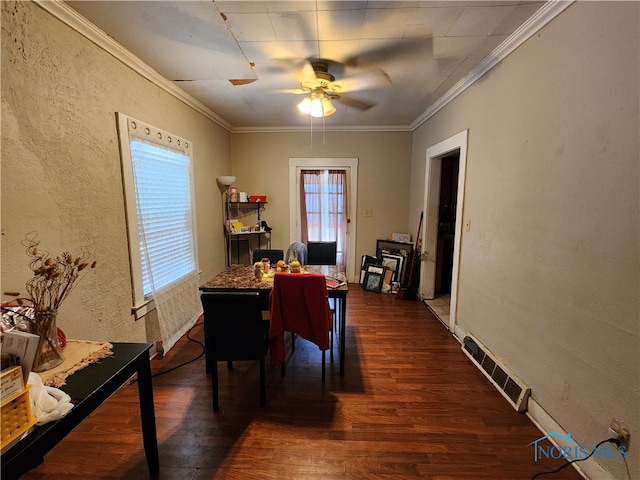 dining room featuring crown molding, ceiling fan, and dark hardwood / wood-style flooring