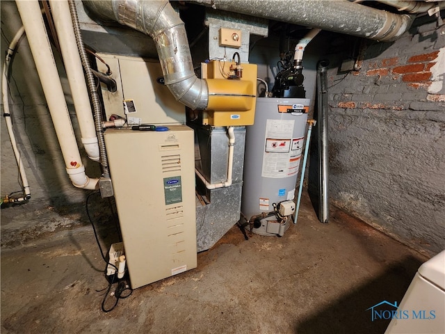 utility room with gas water heater