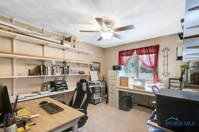 office area with light carpet and ceiling fan