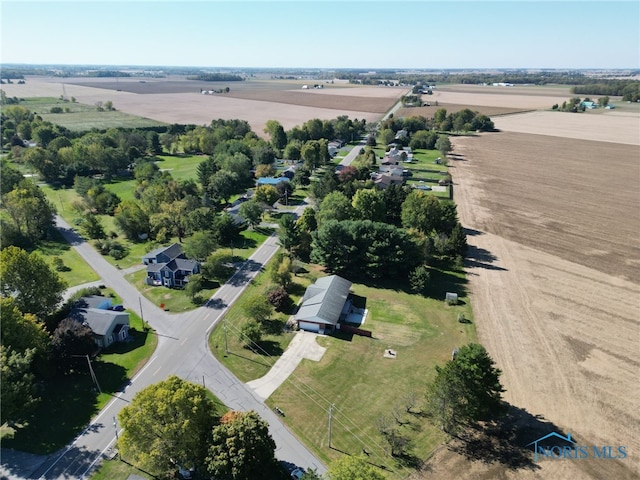 birds eye view of property featuring a rural view