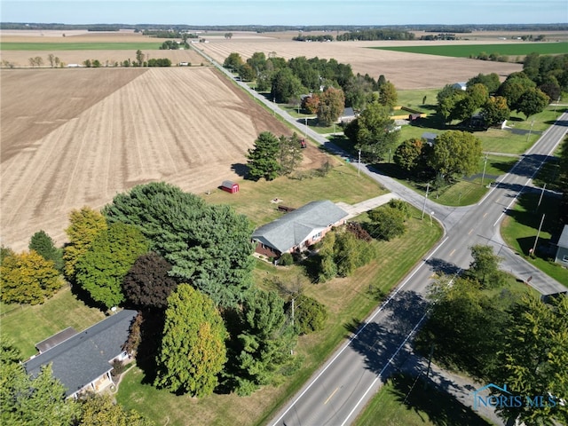 birds eye view of property featuring a rural view