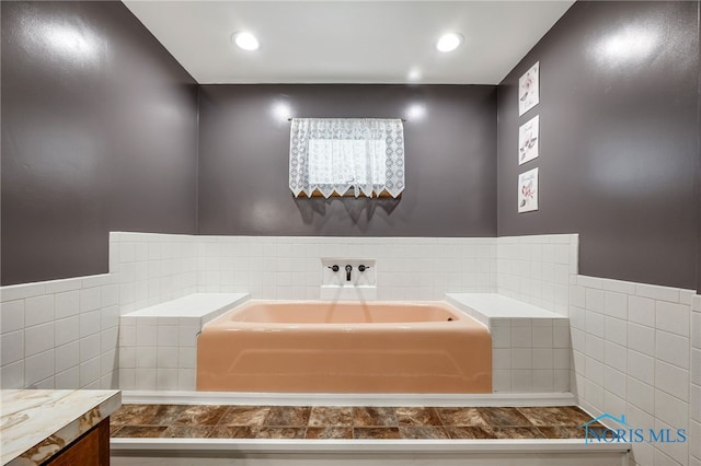 bathroom featuring a tub