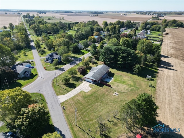 birds eye view of property featuring a rural view