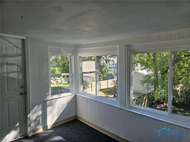 view of unfurnished sunroom