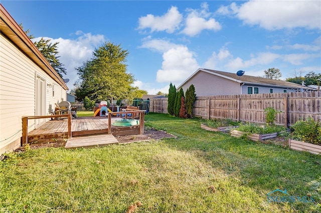 view of yard featuring a deck