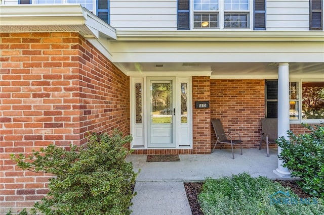 property entrance with a porch