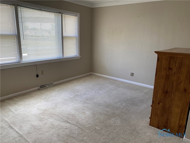 view of carpeted spare room