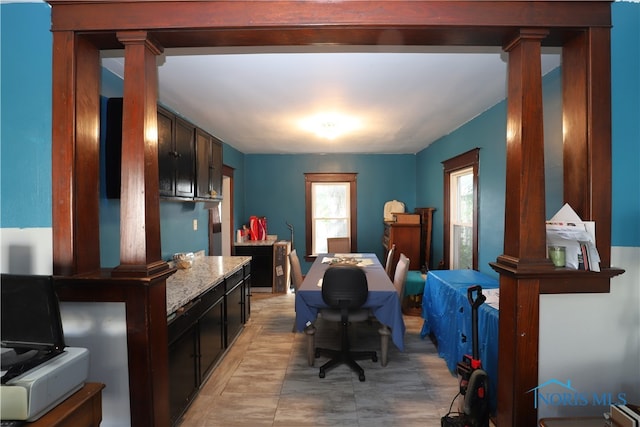 home office with decorative columns