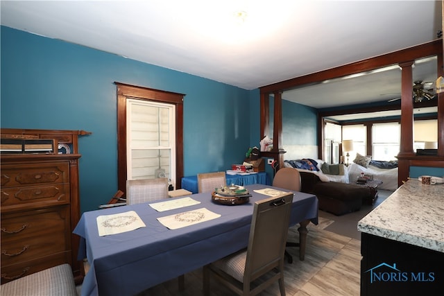 dining area with light hardwood / wood-style flooring