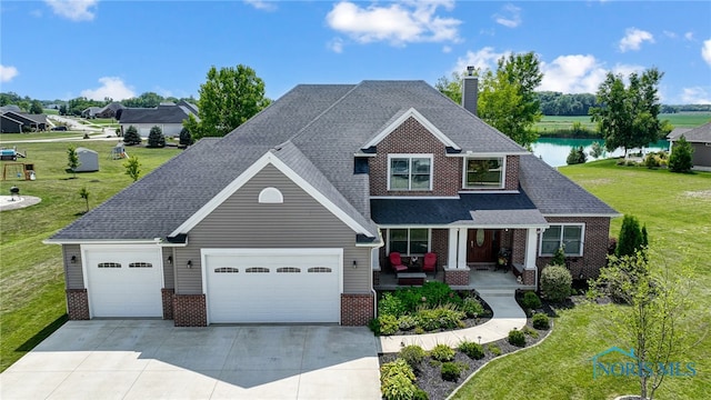 craftsman house with covered porch and a front lawn