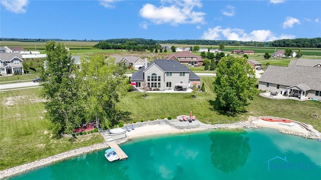 aerial view with a water view and a view of the beach