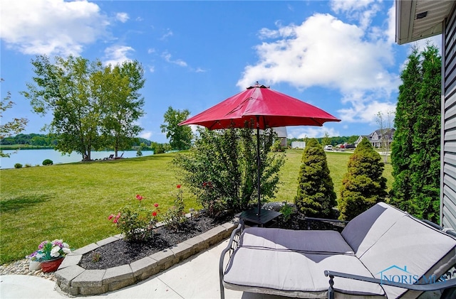 view of patio featuring a water view