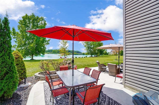 view of patio / terrace with a water view