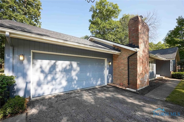 exterior space with a garage