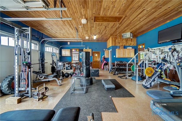 exercise room with wood ceiling