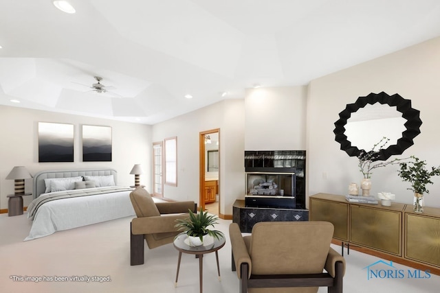 bedroom featuring ensuite bathroom and ceiling fan