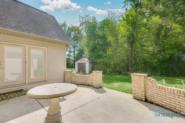 view of patio featuring a storage shed