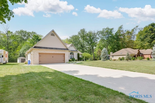 view of front of house featuring a front lawn and a garage