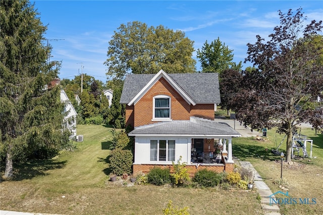 exterior space with a lawn and a porch