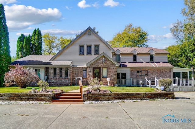 front facade with a front lawn