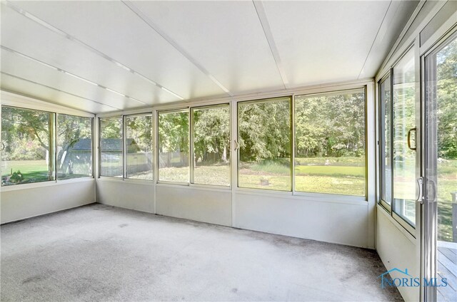 unfurnished sunroom with plenty of natural light