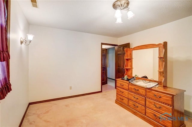 9740 Maumee Western Rd, Monclova, OH 43542 - bedroom with visible vents, baseboards, and light carpet