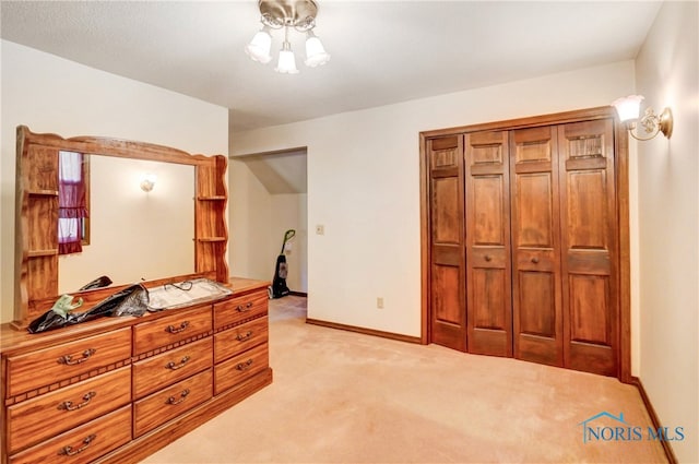 carpeted bedroom with a closet