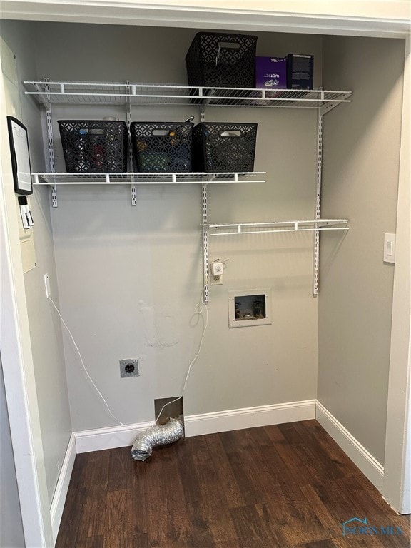 washroom featuring washer hookup, hookup for an electric dryer, and hardwood / wood-style floors