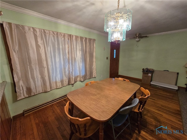 dining area featuring dark wood-type flooring, ceiling fan with notable chandelier, and crown molding