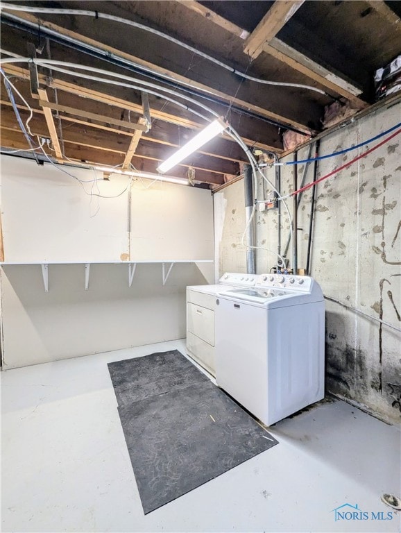 basement featuring separate washer and dryer