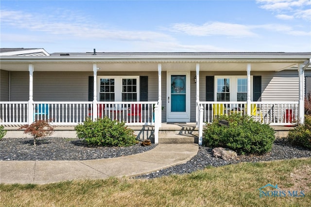 view of front of home featuring covered porch