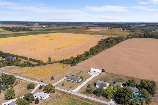 birds eye view of property featuring a rural view