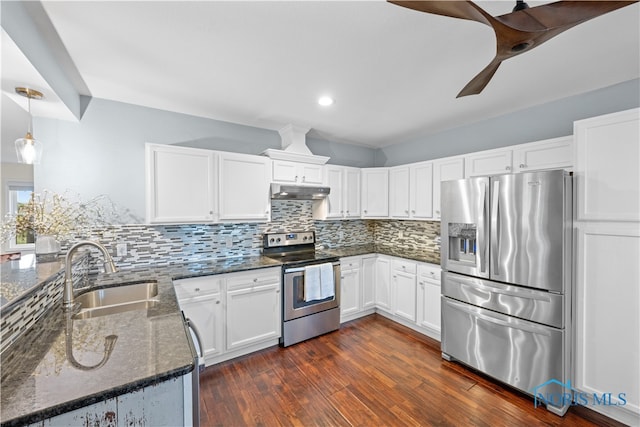 kitchen featuring pendant lighting, sink, white cabinets, stainless steel appliances, and dark hardwood / wood-style flooring