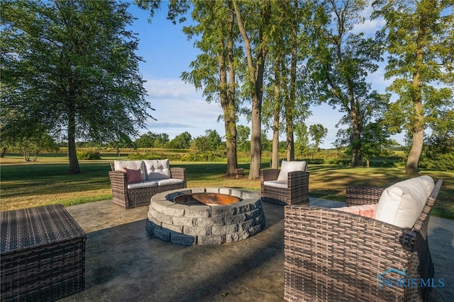 view of patio featuring a fire pit