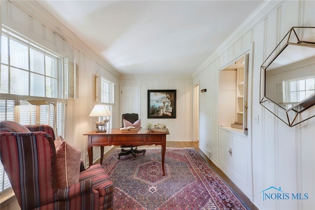 office featuring crown molding and hardwood / wood-style flooring