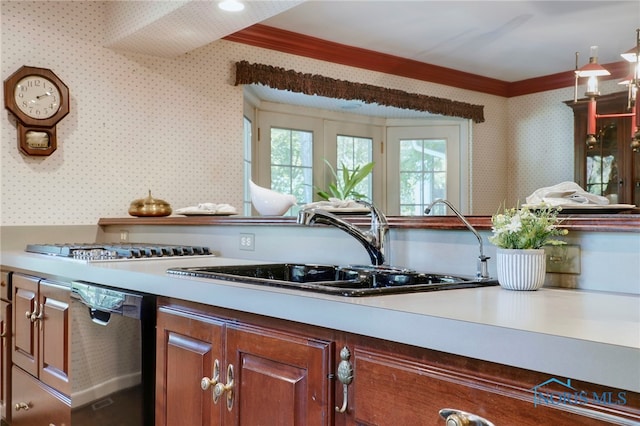 kitchen with dishwasher, sink, and crown molding