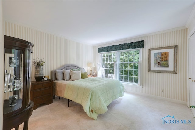 carpeted bedroom with crown molding