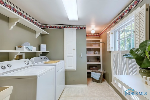 laundry area featuring washer and clothes dryer