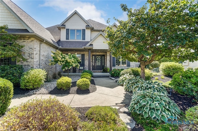 craftsman-style home with covered porch