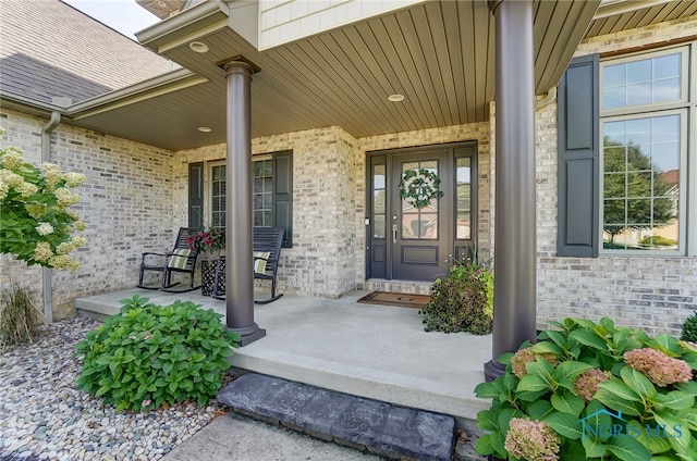 doorway to property featuring a porch