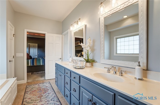 bathroom featuring vanity and tile patterned floors