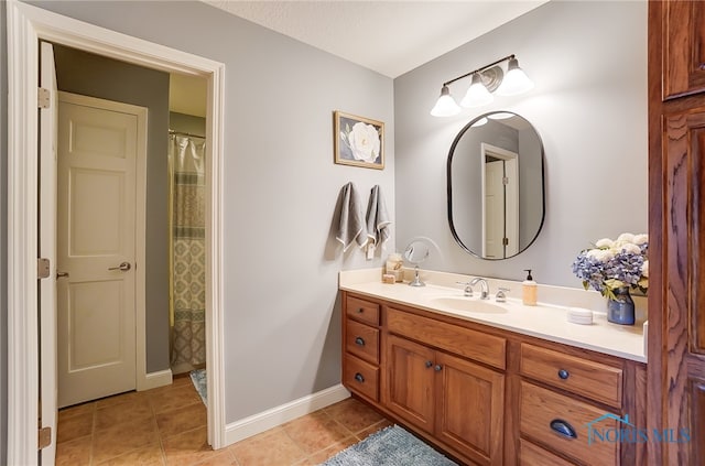 bathroom featuring vanity and tile patterned floors