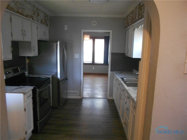 kitchen with black / electric stove, white cabinets, ornamental molding, dark hardwood / wood-style floors, and sink