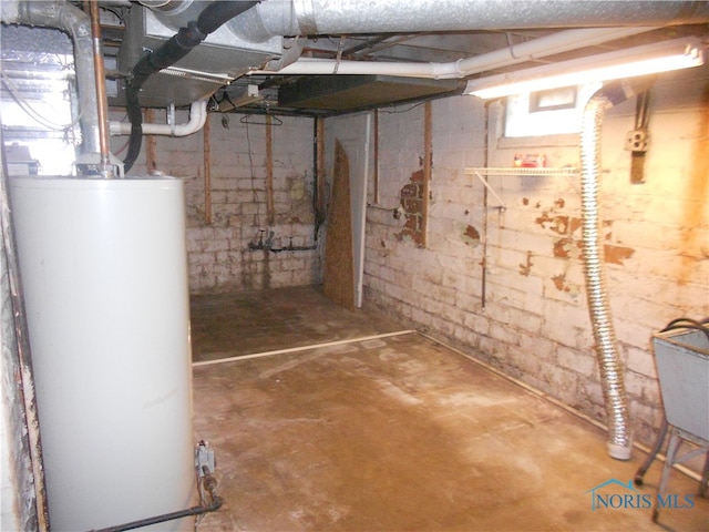 basement featuring gas water heater