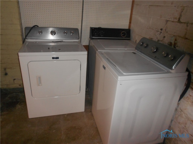 laundry area featuring independent washer and dryer