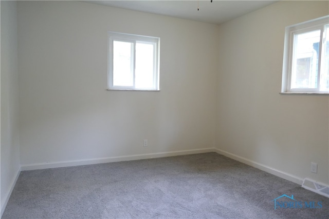 view of carpeted spare room