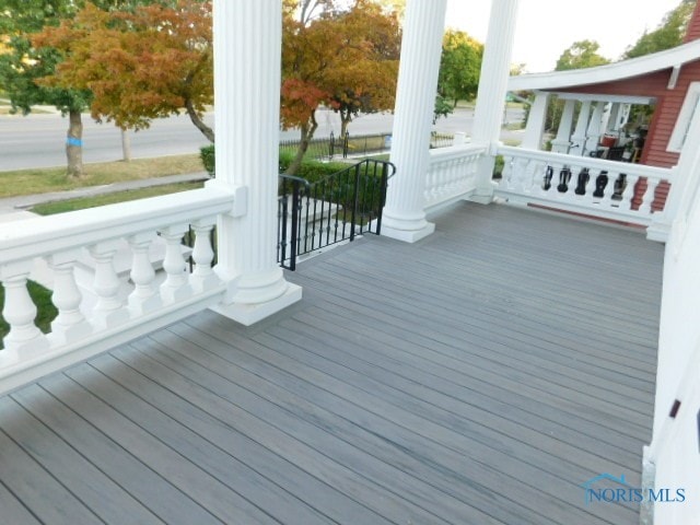 wooden terrace featuring a porch