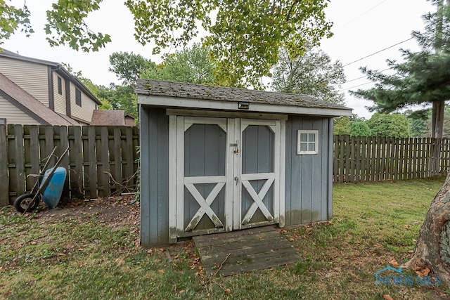 view of outdoor structure featuring a yard