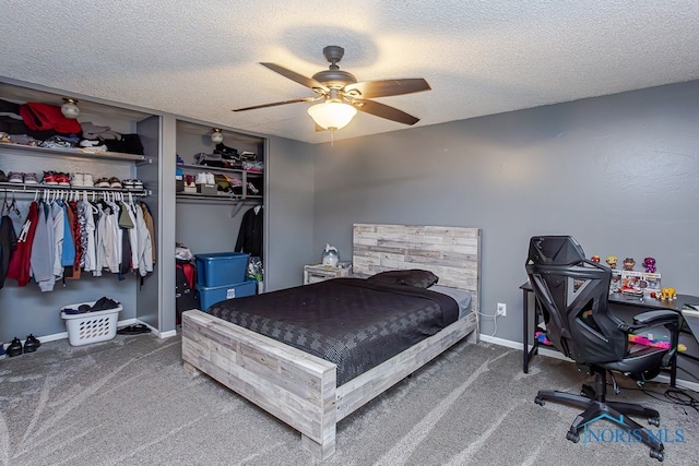 carpeted bedroom featuring a closet, ceiling fan, and a textured ceiling