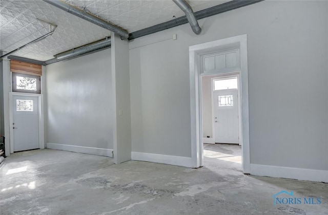 garage with baseboards